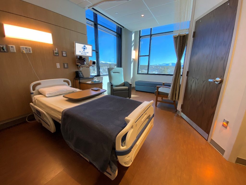 A color photo of the corner inpatient room at St. Vincent Health in Leadville. With mountain views